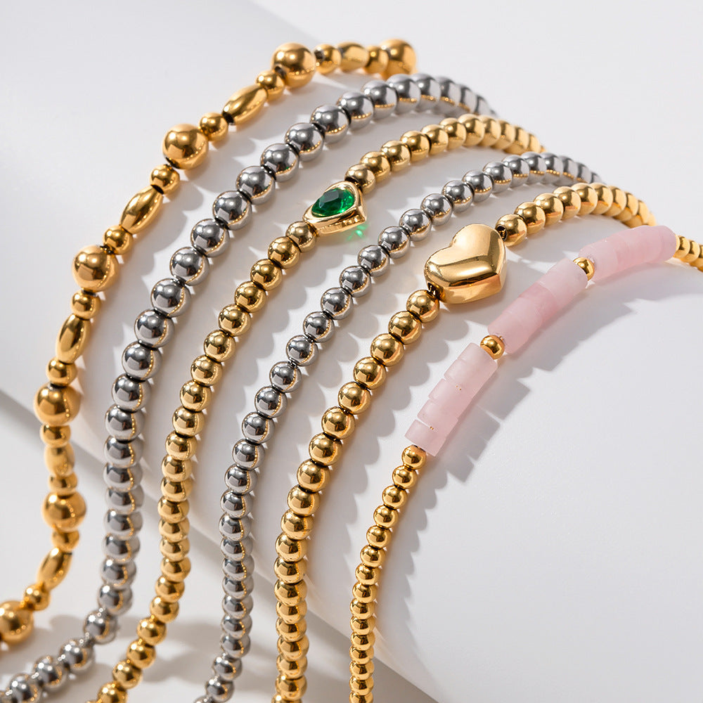 Wholesale Titanium Steel 16k Gold Bead Green Heart Zircon Bracelet